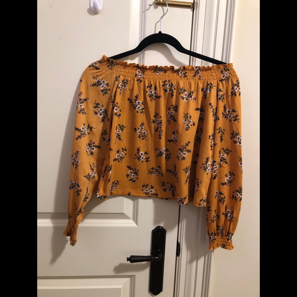 Divided off shoulder top
